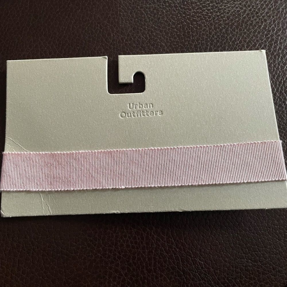 Urban Outfitters choker pink with gold. Adjustable. NWT and packaging.